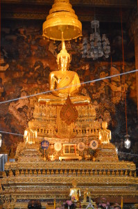 This is a view of a sitting Buddha from inside the temple. All visitors must take their shoes to enter this temple.