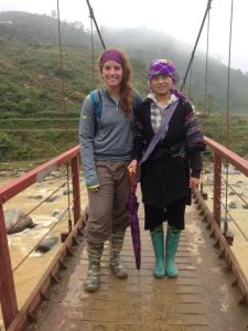 trekking through the mountains and valleys of Sapa in Northern Vietnam with a local Black Hmong hilltribe woman.