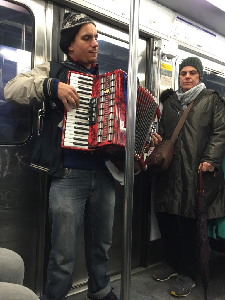 Entertainment on the metro in Paris, France. 