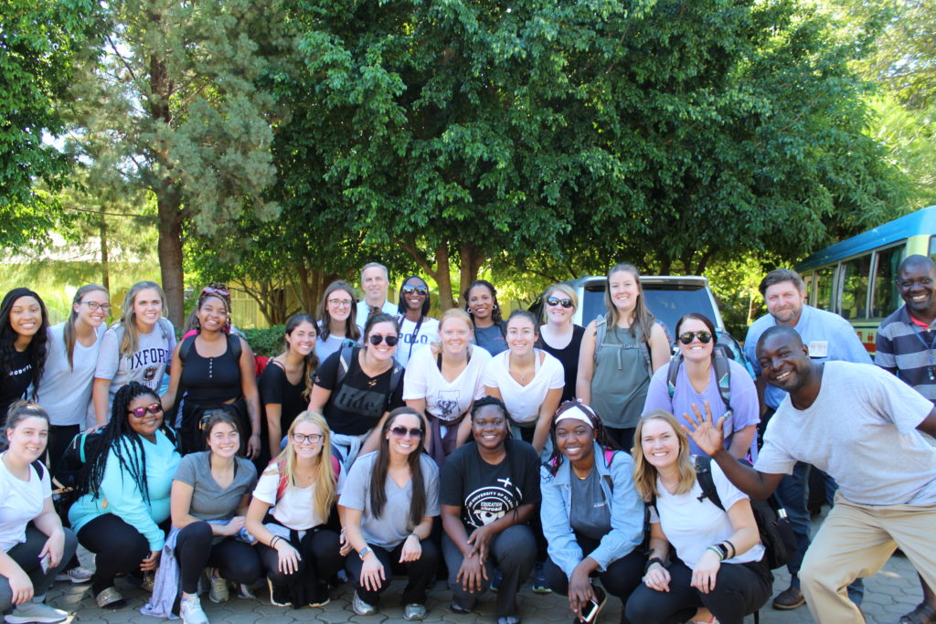 The Capstone College of Nursing Team grouped together as they arrived at the Chapa Classic Lodge in Zambia, Africa. 